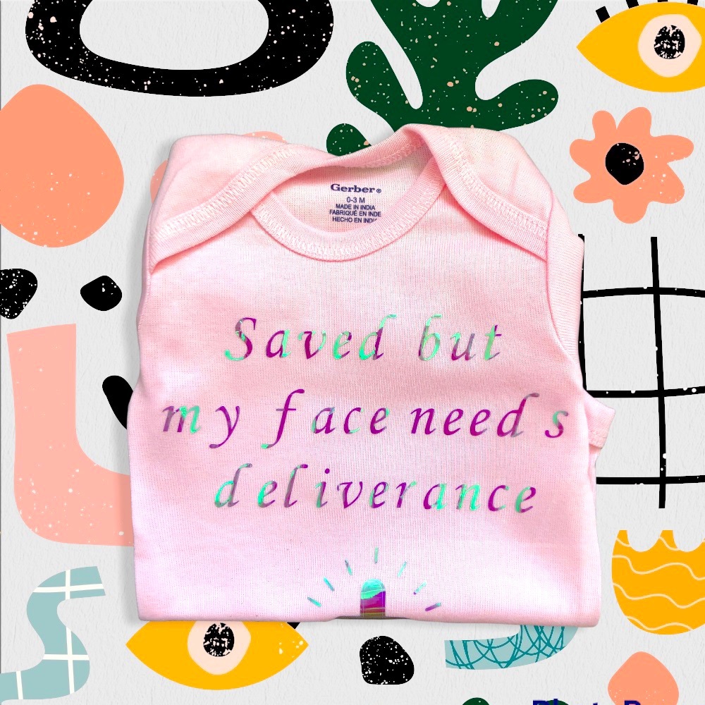 “Saved” funny baby girl onesie